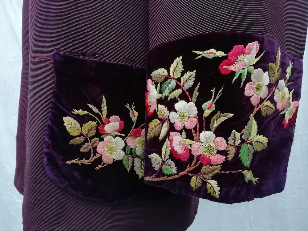 Detail showing embroidery before conservation, © Zenzie Tinker Conservation