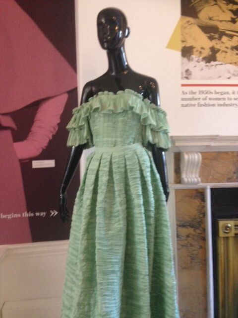 Image of the green pleated linen gown by Sybil Connolly circa 1960’s. 