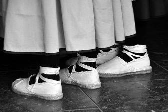 Traditional white espadrilles with the ankle lacing © Jigsaw    