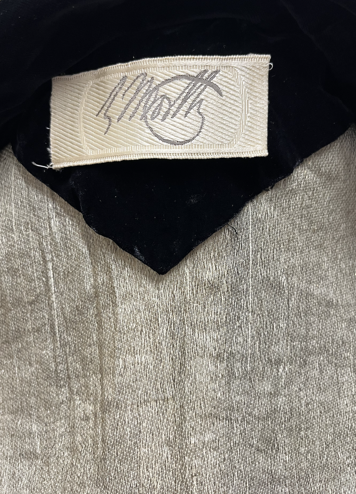 Label depicting Worth's signature. Image courtesy of Sue Mear.