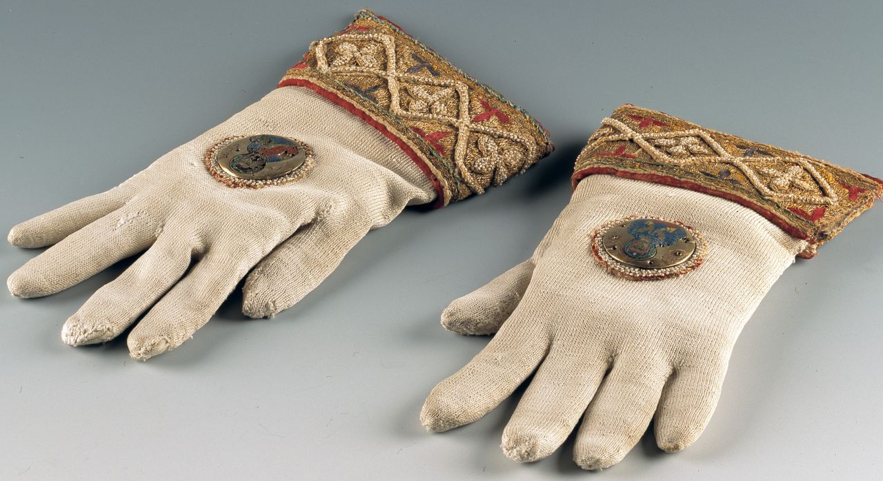 Image 2. Liturgical gloves from Brixen Cathedral Treasury, Italy; image: © Diocesan Museum Hofburg Bressanone (https://kemeresearch.com/gloves/38)<br />
