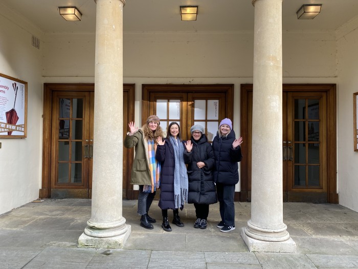The Fashion Museum curatorial team waving goodbye to the Assembly Rooms in March 2023