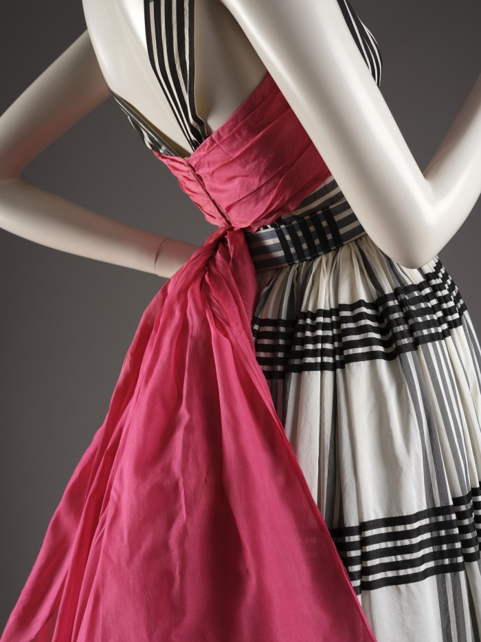 Black, white and pink evening dress made from Seker’s Nylon with belt and pink organza bow, Horrockses Fashions, c. 1953. Photograph by Simon Critchley. The Harris (2016.12.18).