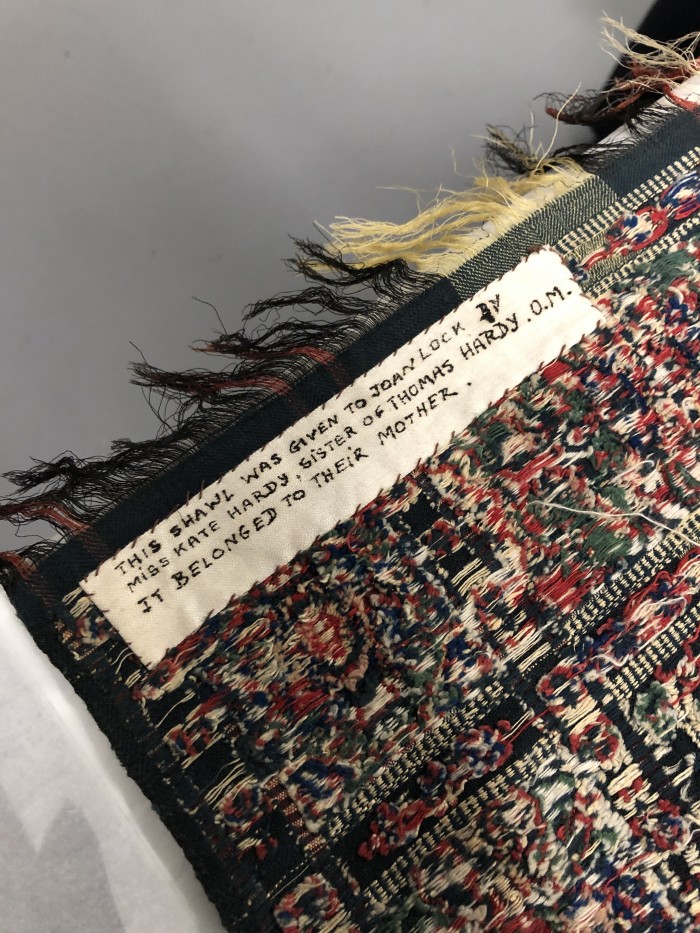 Detail of provenance label on Jemima's shawl