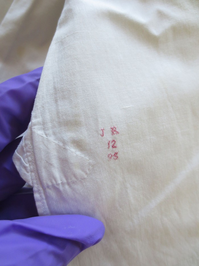 Figure 4:Detail of embroidered laundry mark on Ruskin’s shirt. Image courtesy of Sarah Casey.