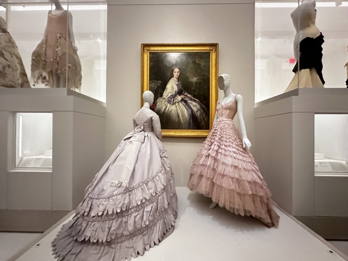 Abstract Body: Charles Frederick Worth (French born England 1825-1995) Ensemble, Purple silk taffeta / Franz Xaver Winterhalter (German 1805-1873) Countesse Alexander Nikolaevitch Lamsdorff, Oil on Canvas, 1859 / house of Dior-Christian Dior ( French 1905-1957) Eugenie, ball gown, Pink Silk Tulle, beige nylon net and pink suede. Costume Art © Photo Jane Francis