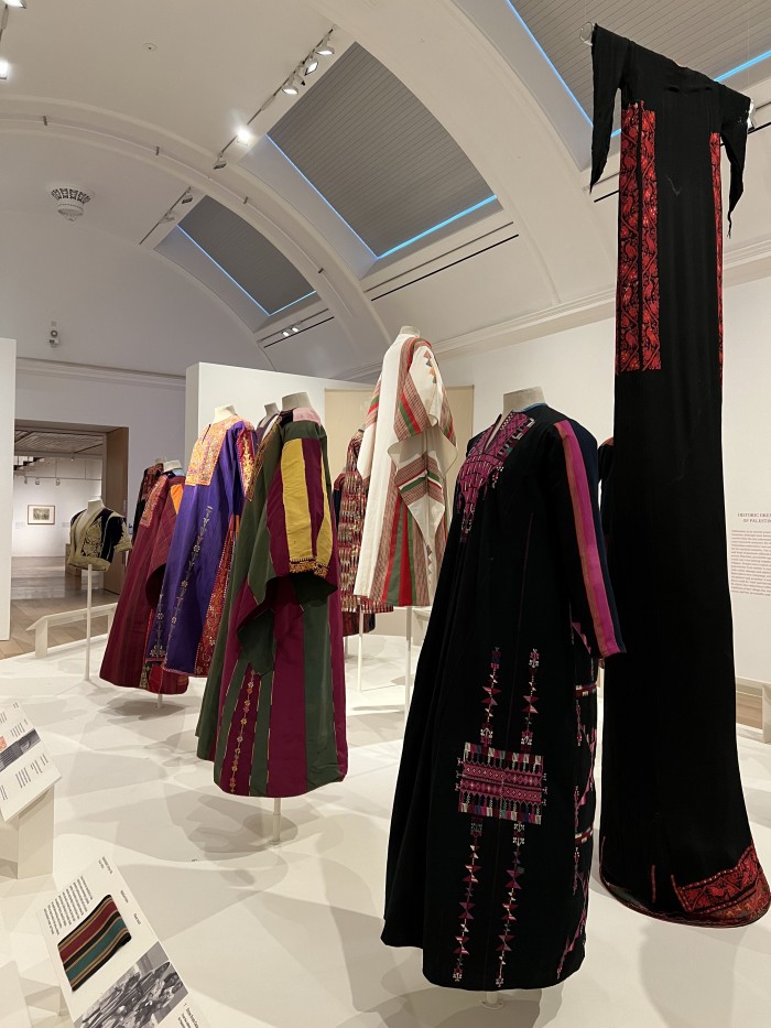 Examples of regional garment styles and embroidery in the first room of Material Power. 