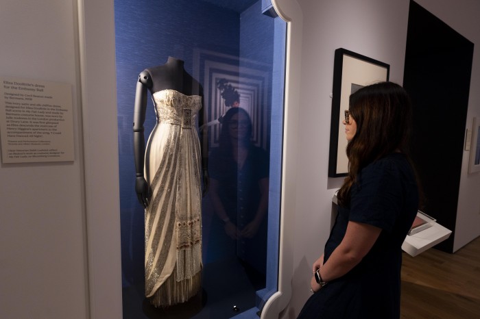 A visitor observing portraits in the exhibition Cecil Beaton’s fashionable World at the National Portrait Gallery.