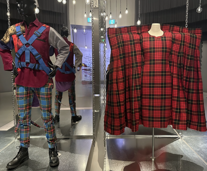 Seditionaries, London (retailer) Vivienne Westwood & Malcom McLaren (designer) Parachute Shirt 1977

Comme des Garçons, Tokyo (fashion house) Japan est. 1969. Rei Kawakubo (designer) Japan born 1942. Look 7, dress 2016 -Invisible Clothes collection, spring–summer 2017-wool polyester, cupra. Collection of Octavius La Rosa, dot COMME, Paris © Jane Francis / NGV