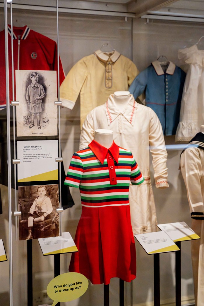 Display featuring John Barran and Sons tunics, © Leeds Museums and Galleries photograph by Jemma Mickleburgh